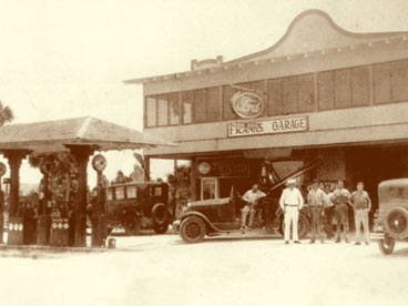 Ed Frank (extreme right) with his brothers at Frank's Garage in 1929.  Located on the Southeast corner of 1st Street South and the Tamiami Trail.  Although best remembered as the inventor of the swamp buggy, Ed Frank opened the first garage in Naples in 1927 and operated the town's first automotive (Ford) dealership.  Frank's Garage was also the first commercial building on 5th Avenue South.